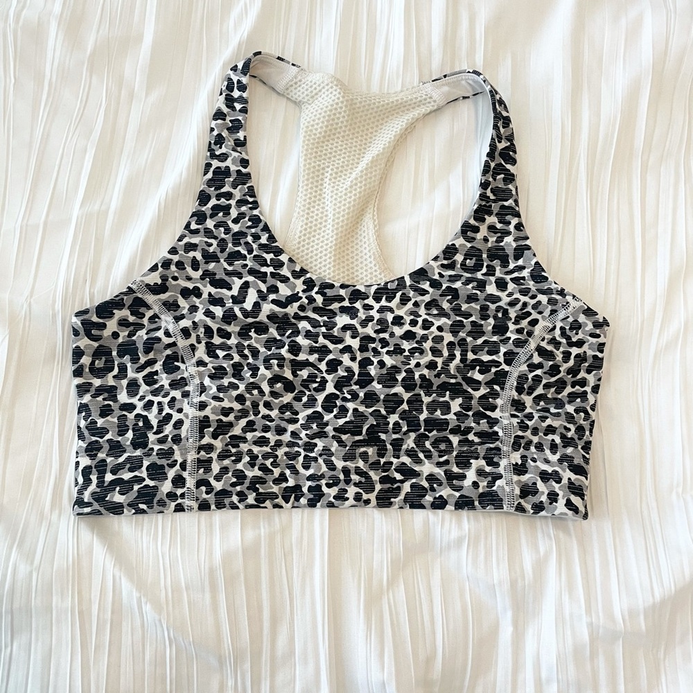 2 Outdoor Voices sports bras in SMALL. Great condition. 1 green, 1 animal print